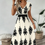 Candela - Vestido maxi barroco con escote en V
